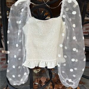 EUC White Polka Dot Top with sheer sleeves.